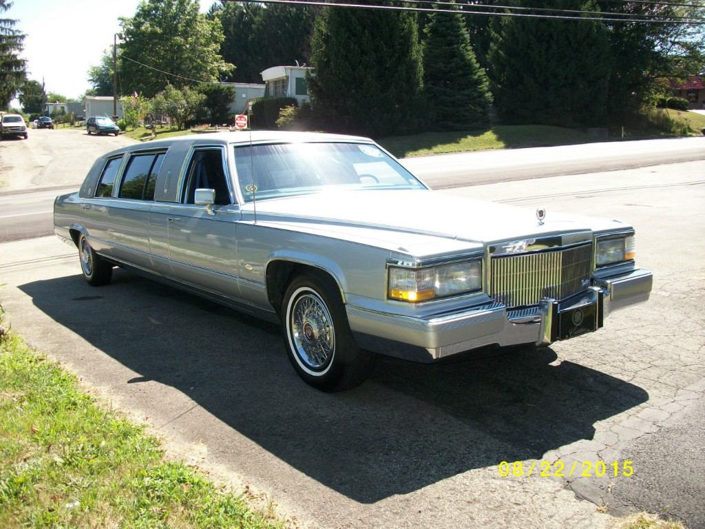 23′ Silver 1990 Cadillac Brougham Limo