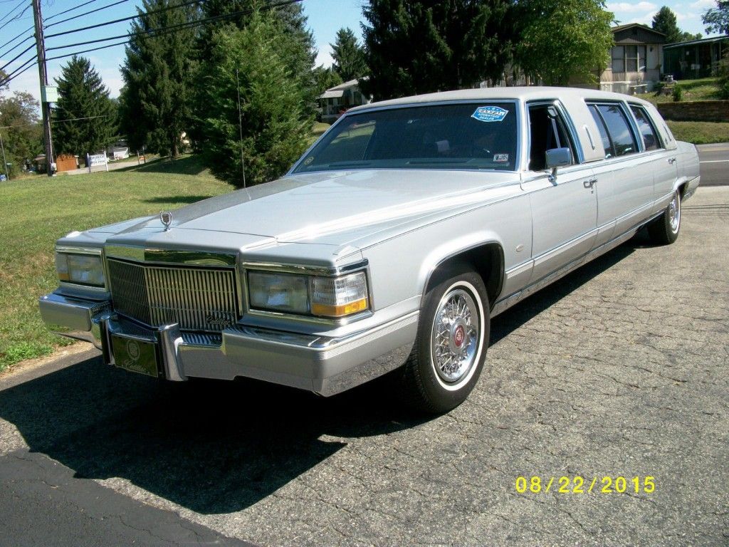 23′ Silver 1990 Cadillac Brougham Limo